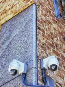 Security Cameras mount on the corner of the building